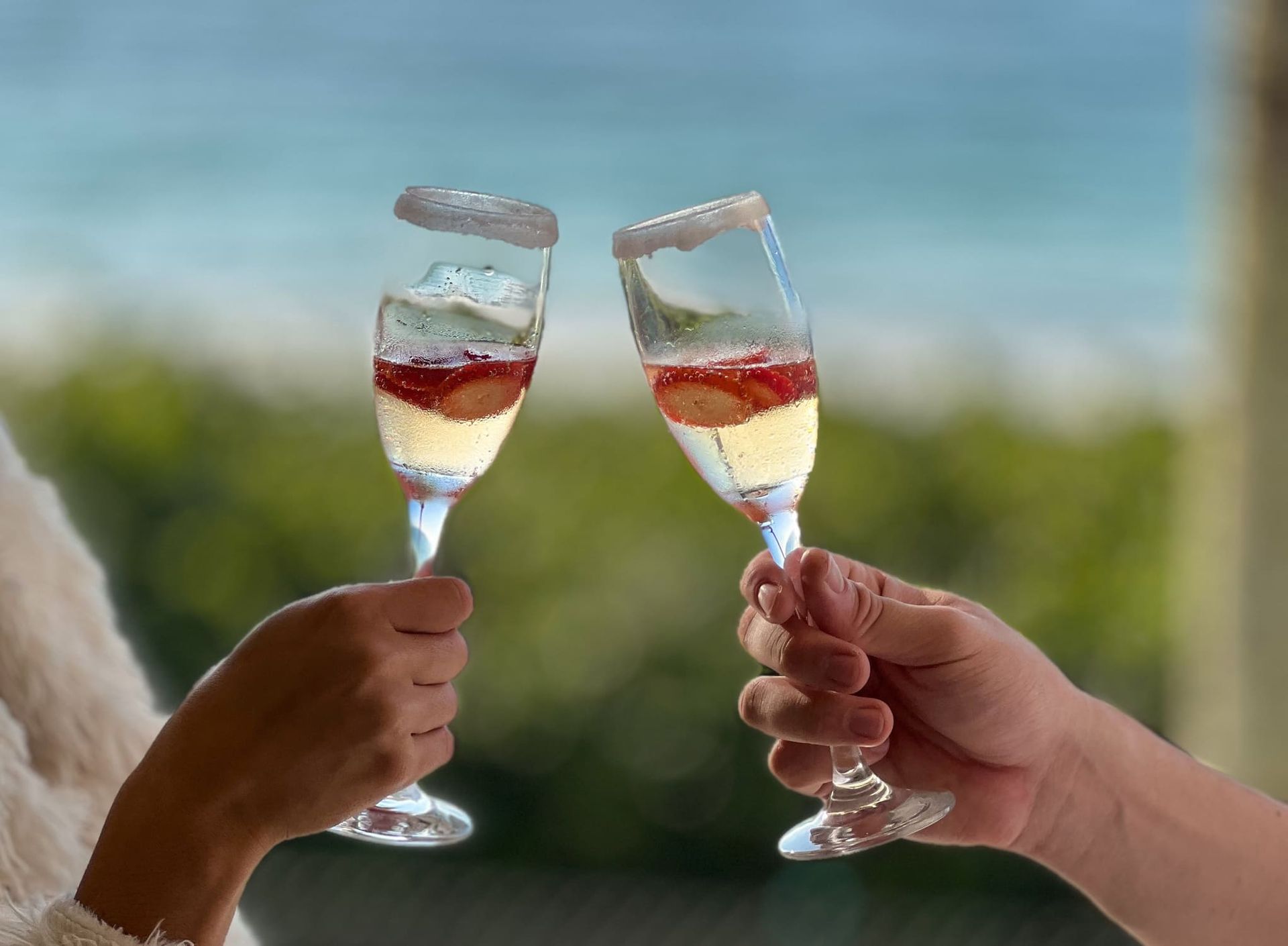 A man and a woman are toasting with champagne glasses.