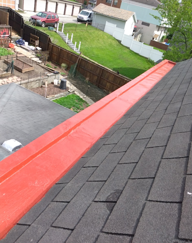 White metal roof with matching guttering system.