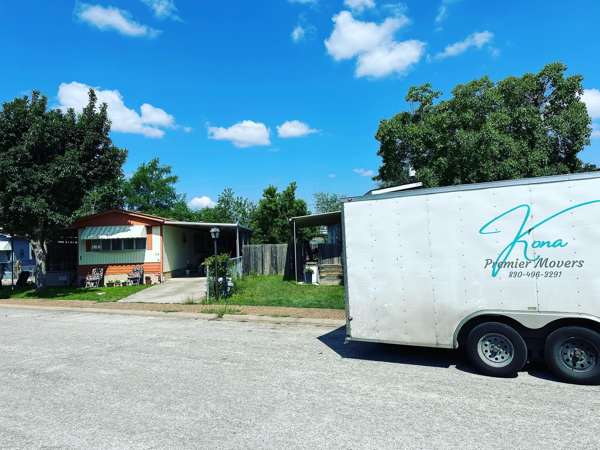 A white trailer with the word home on it