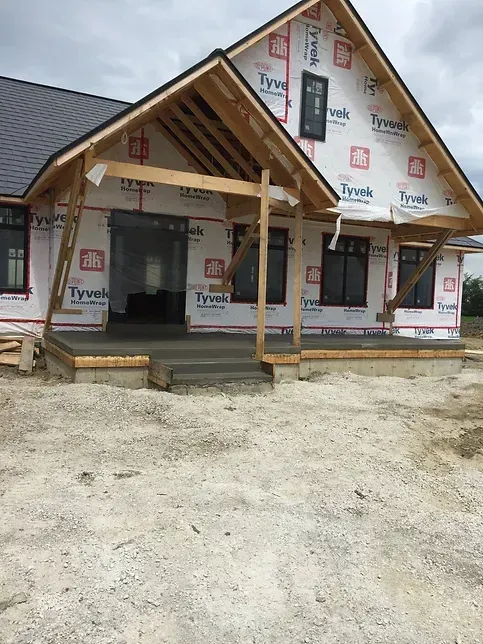A house is being built with styrofoam on the walls.