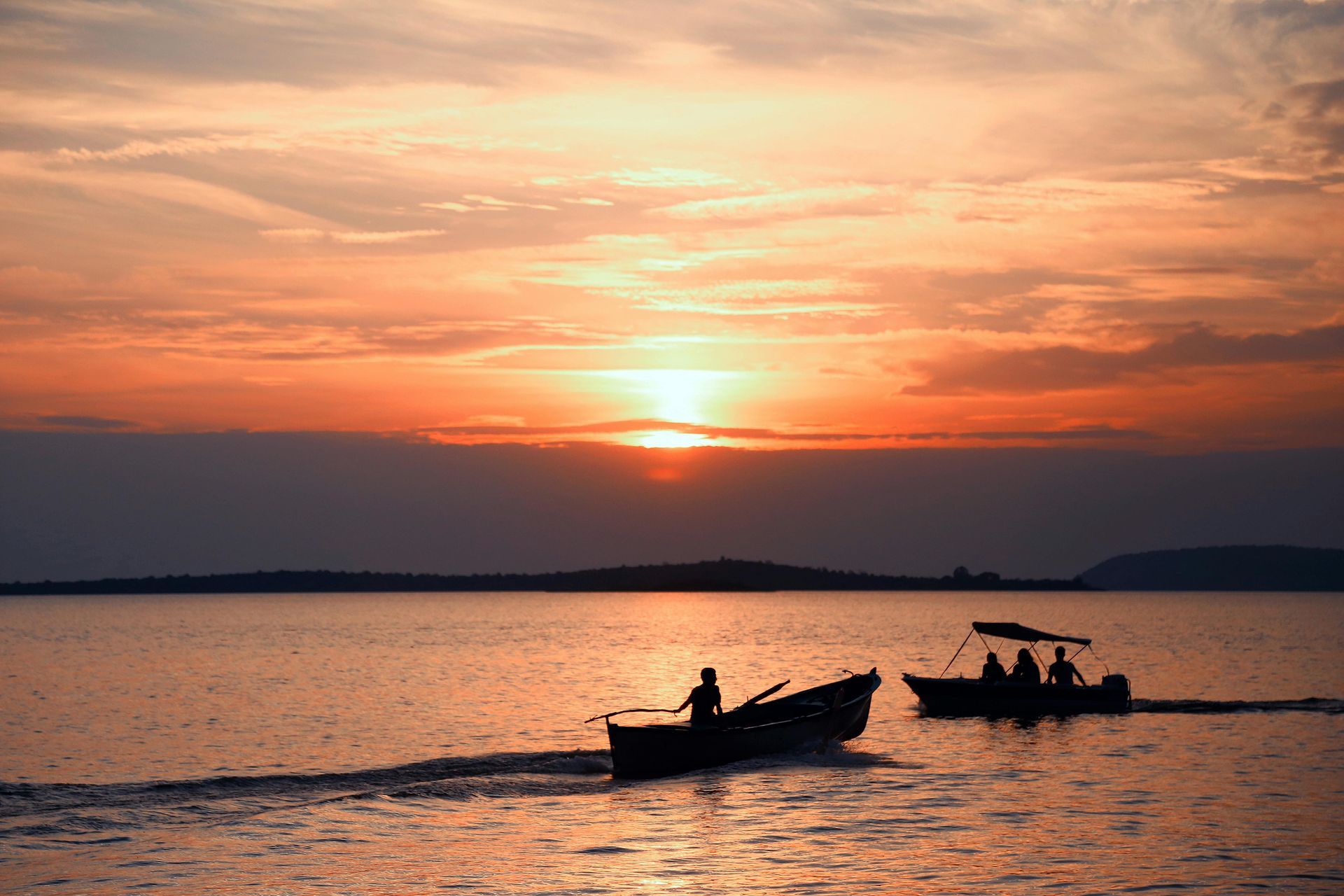 Fishing charter boats on Gulf of Mexico at sunset near Panama City Beach Florida for deep sea fishin