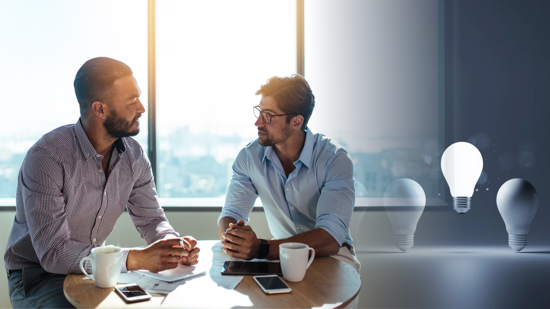 Two businessmen discussing ideas with light bulbs symbolizing innovation and strategy