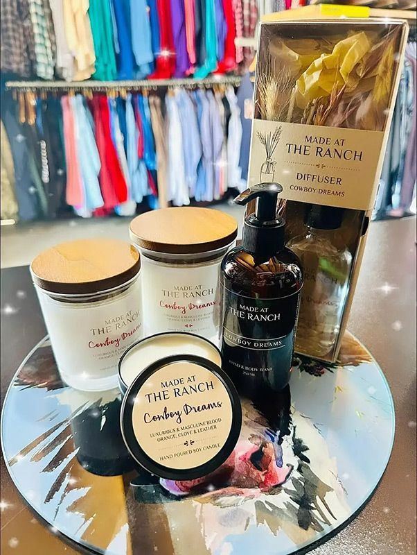 A Table Topped with Candles, Soap, and A Box of Flowers — Country Charm in Charmhaven, NSW