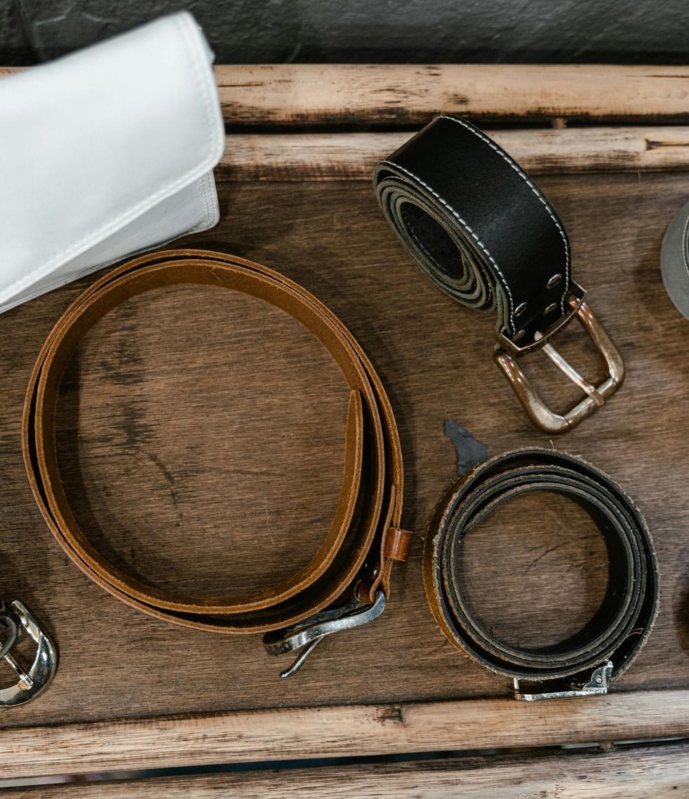 Two Bolo Tie Necklaces Are Sitting on Top of A Cowhide — Country Charm in Charmhaven, NSW
