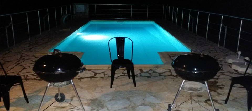 Relaxing night view of the pool at Villa Selene.