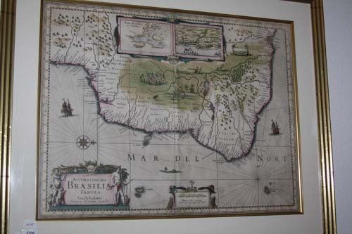 Antique map of Brazil, framed, with detailed coastlines, illustrations, and decorative borders.
