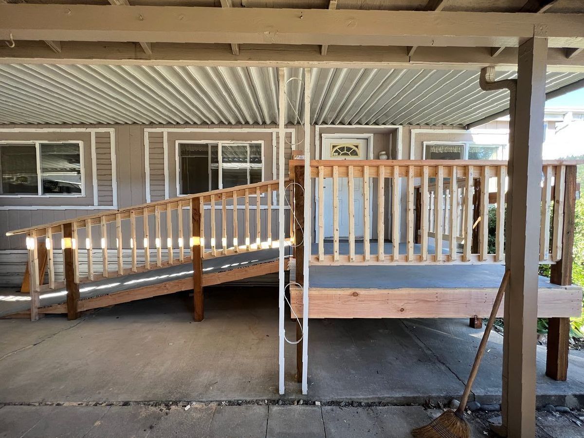 A concrete wall featuring a prominent crack running through its surface.