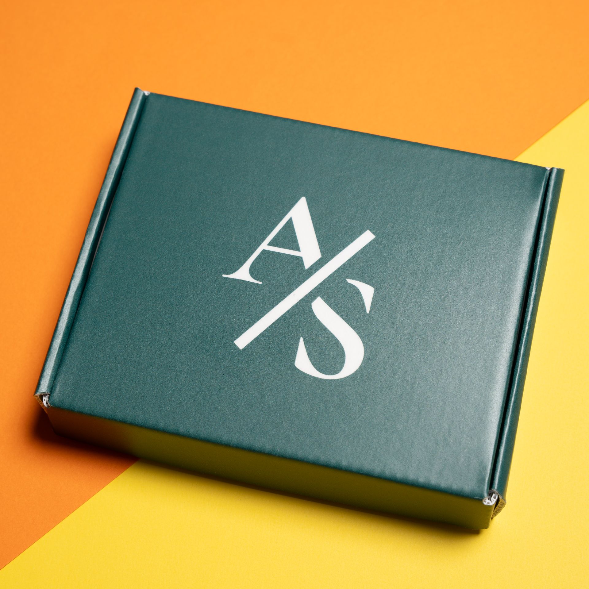 Custom green box with branding elements