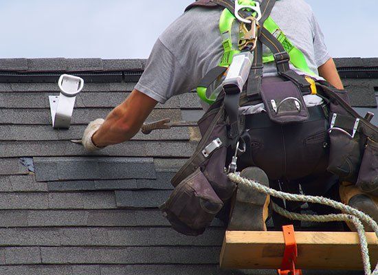 Man Installing Roof — Schenectady, NY — All Seasons Roofing