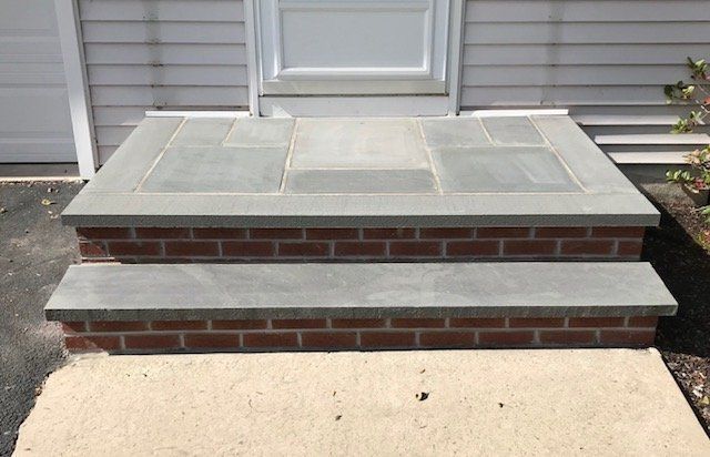 A Set of Stairs Made of Bricks and Tiles in Front of A House — Flemington, NJ — LaFerla Bros Inc.