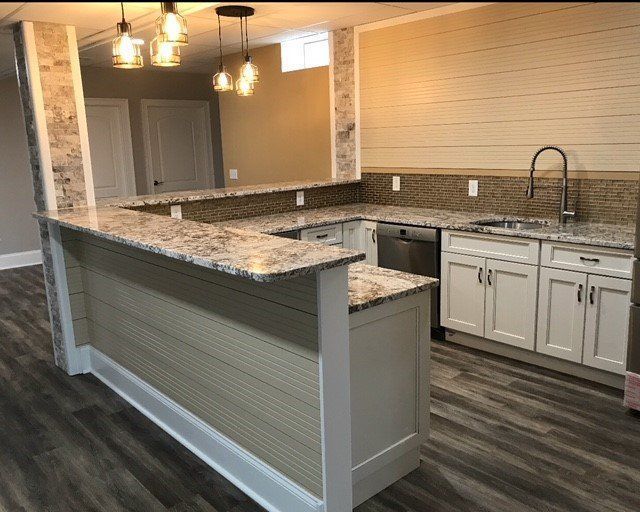 A Kitchen with White Cabinets , Granite Counter Tops , and A Sink — Flemington, NJ — LaFerla Bros Inc.