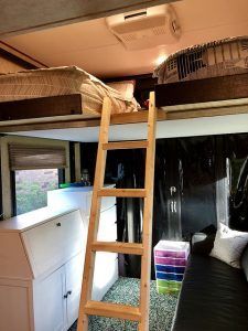 Beds Up a Ladder on a Lift in a toy hauler