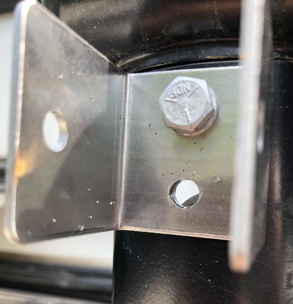 Hole drilled through RV awning arm