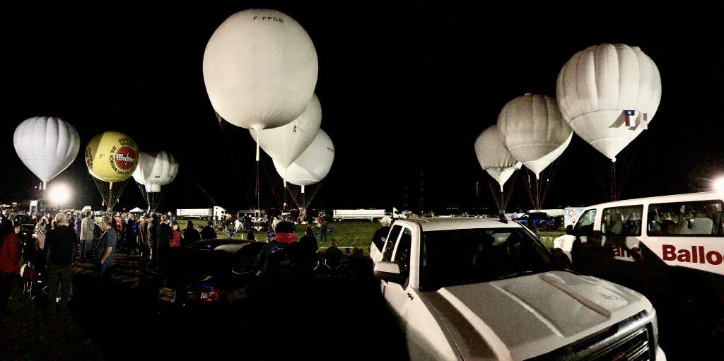 3 rows of gas balloons being inflated