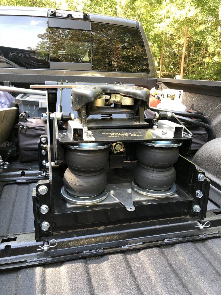A truck with a trailer hitch in the back of it.