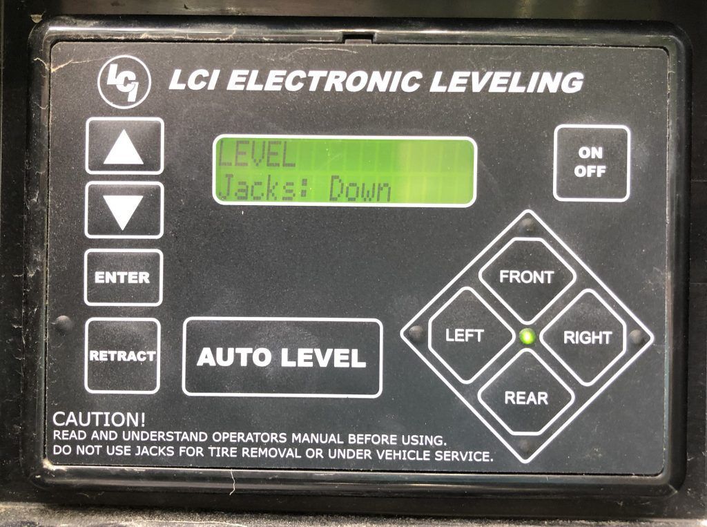 A lci electronic leveling device with a green screen