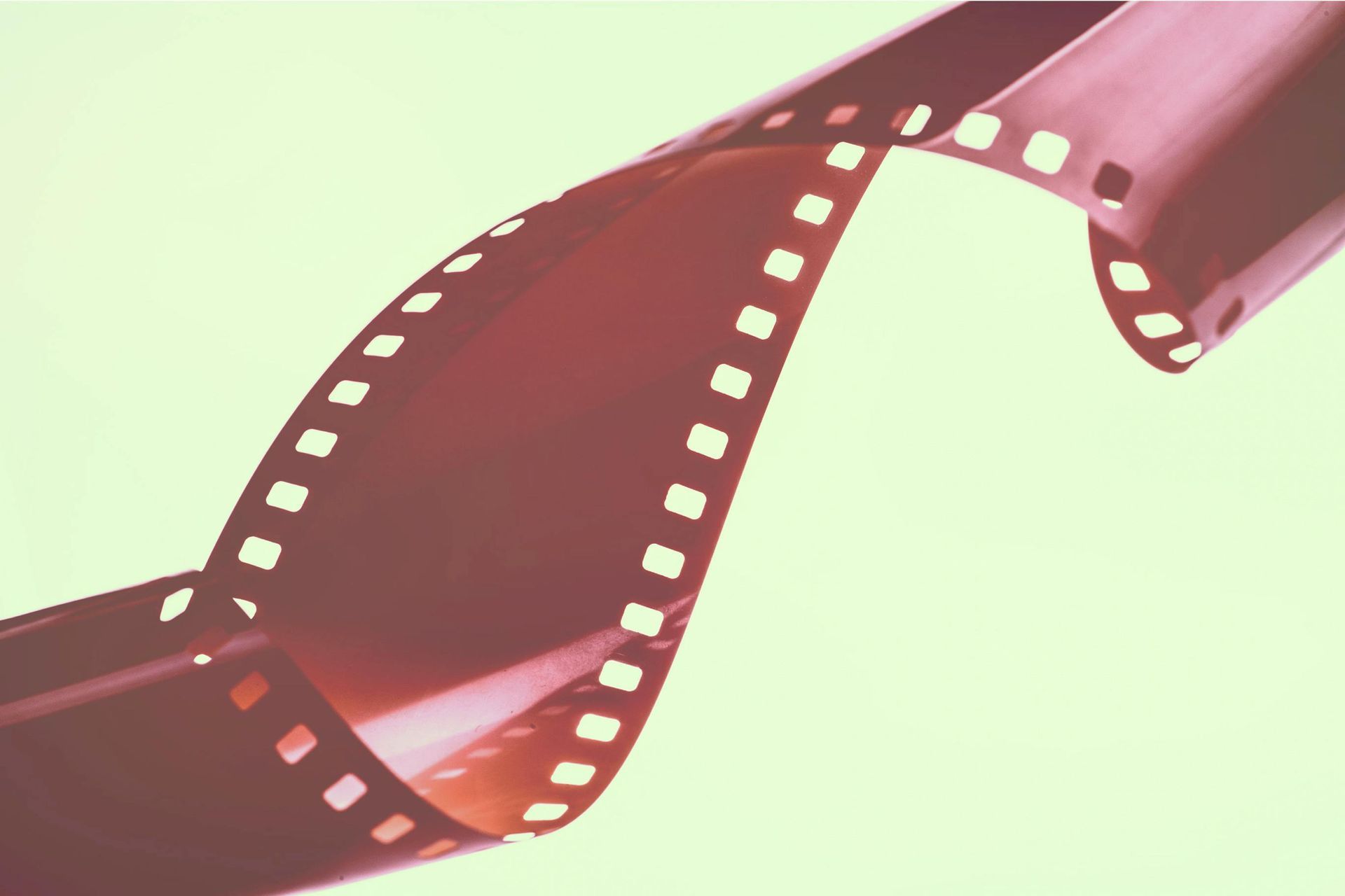 A close up of a film strip on a white background