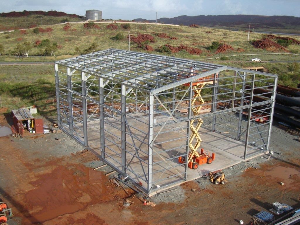 Steel-framed building under construction on a dirt site — More Than Garages Pty Ltd–Ranbuild Tamworth in Taminda, NSW