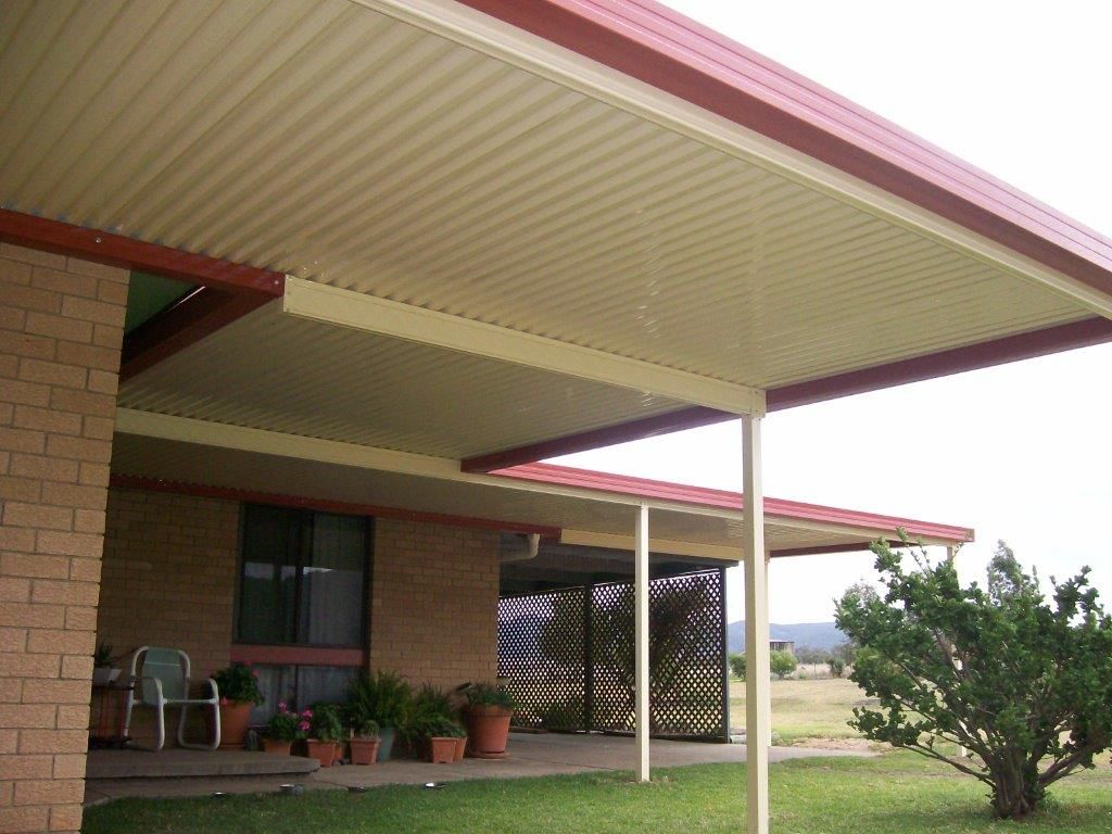 Covered front porch of a brick house with white posts — More Than Garages Pty Ltd–Ranbuild Tamworth in Taminda, NSW