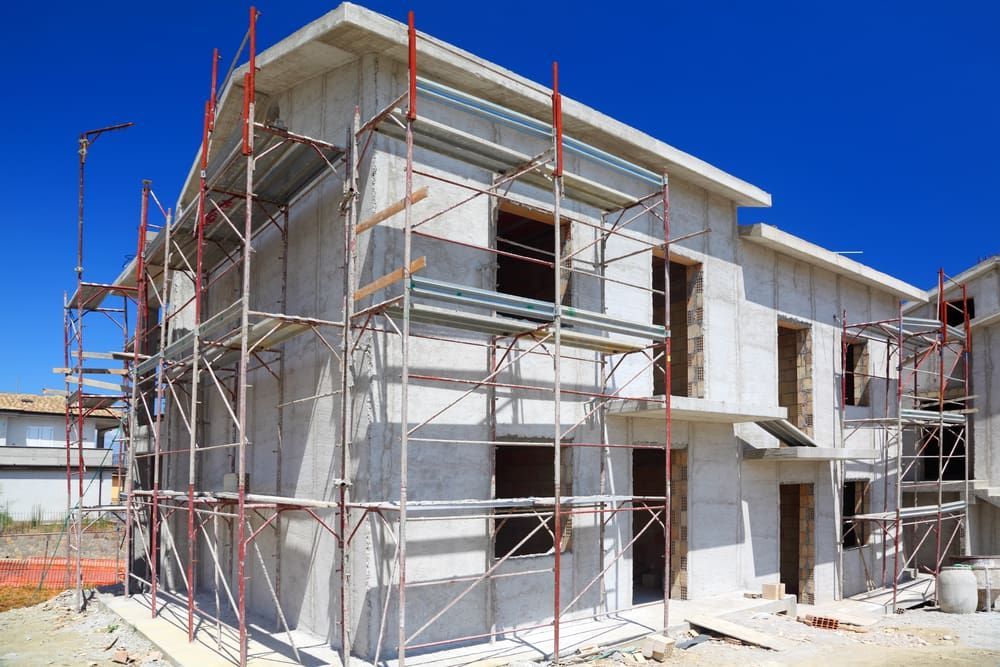 A House Is Being Built With Scaffolding Around It  — More Than Garages Pty Ltd–Ranbuild Tamworth in Taminda, NSW