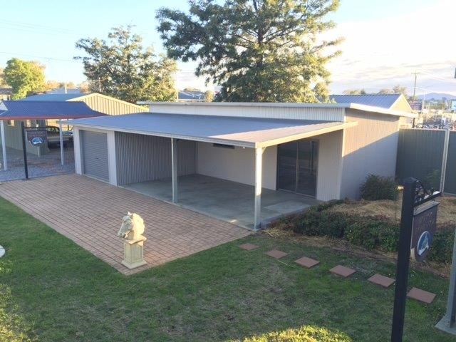 A white building with a double skillion— More Than Garages Pty Ltd–Ranbuild Tamworth in Taminda, NSW