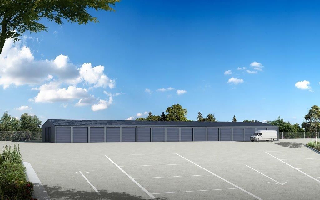 A Row Of blue garage Doors On A Building  — More Than Garages Pty Ltd–Ranbuild Tamworth in Taminda, NSW