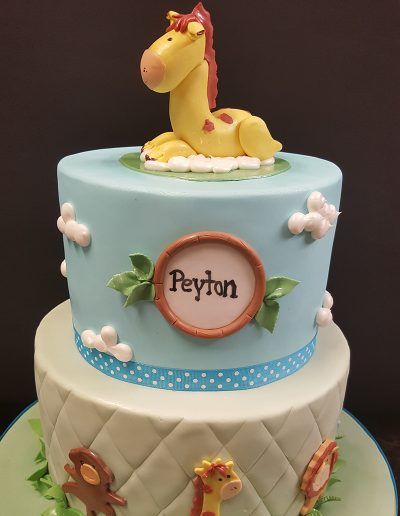 A cake with the name peyton on it