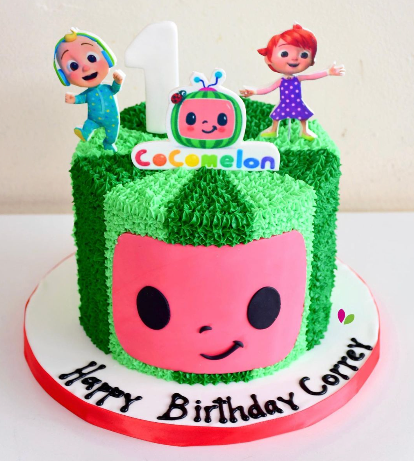 A cake that says happy birthday correy on it