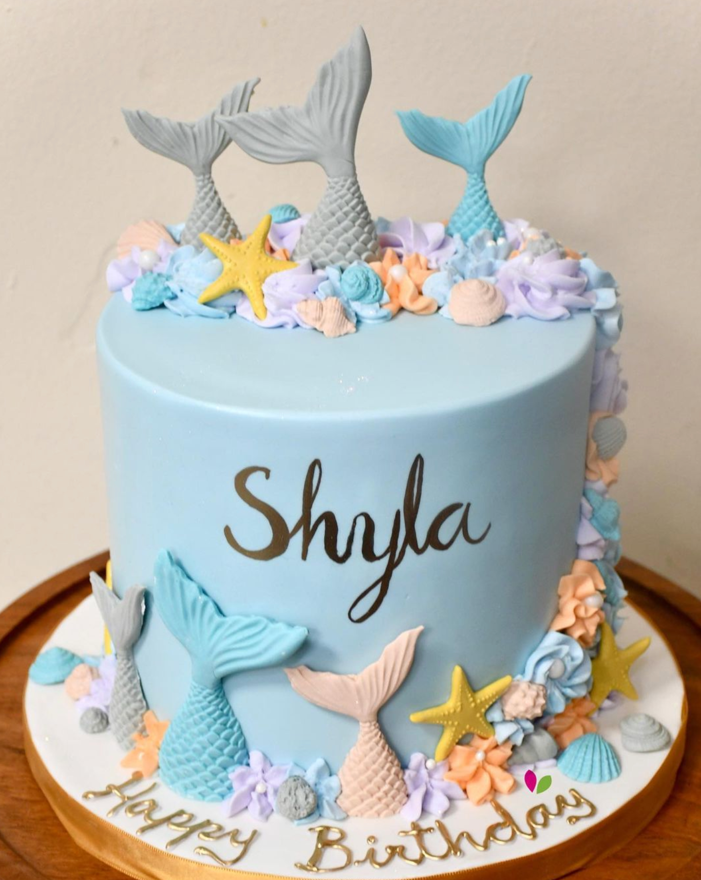 A birthday cake with the name shyla on it
