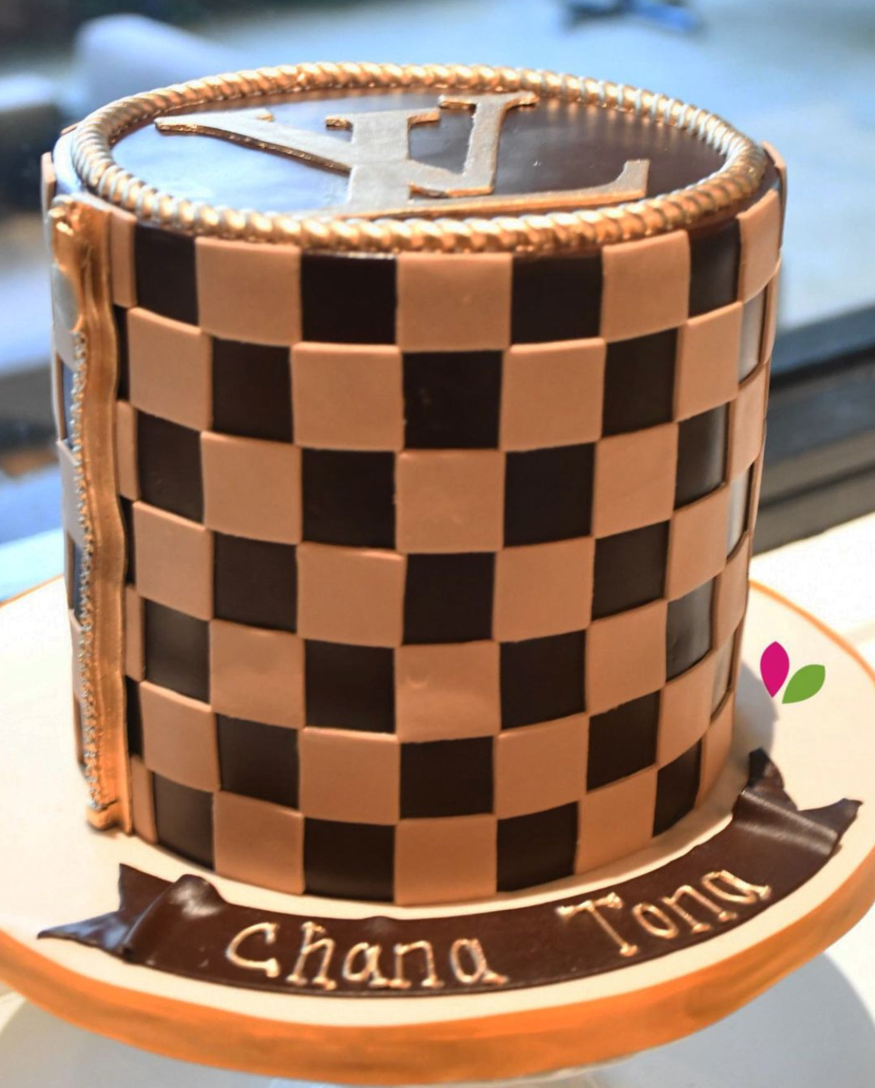 A cake with the name chana tong on it