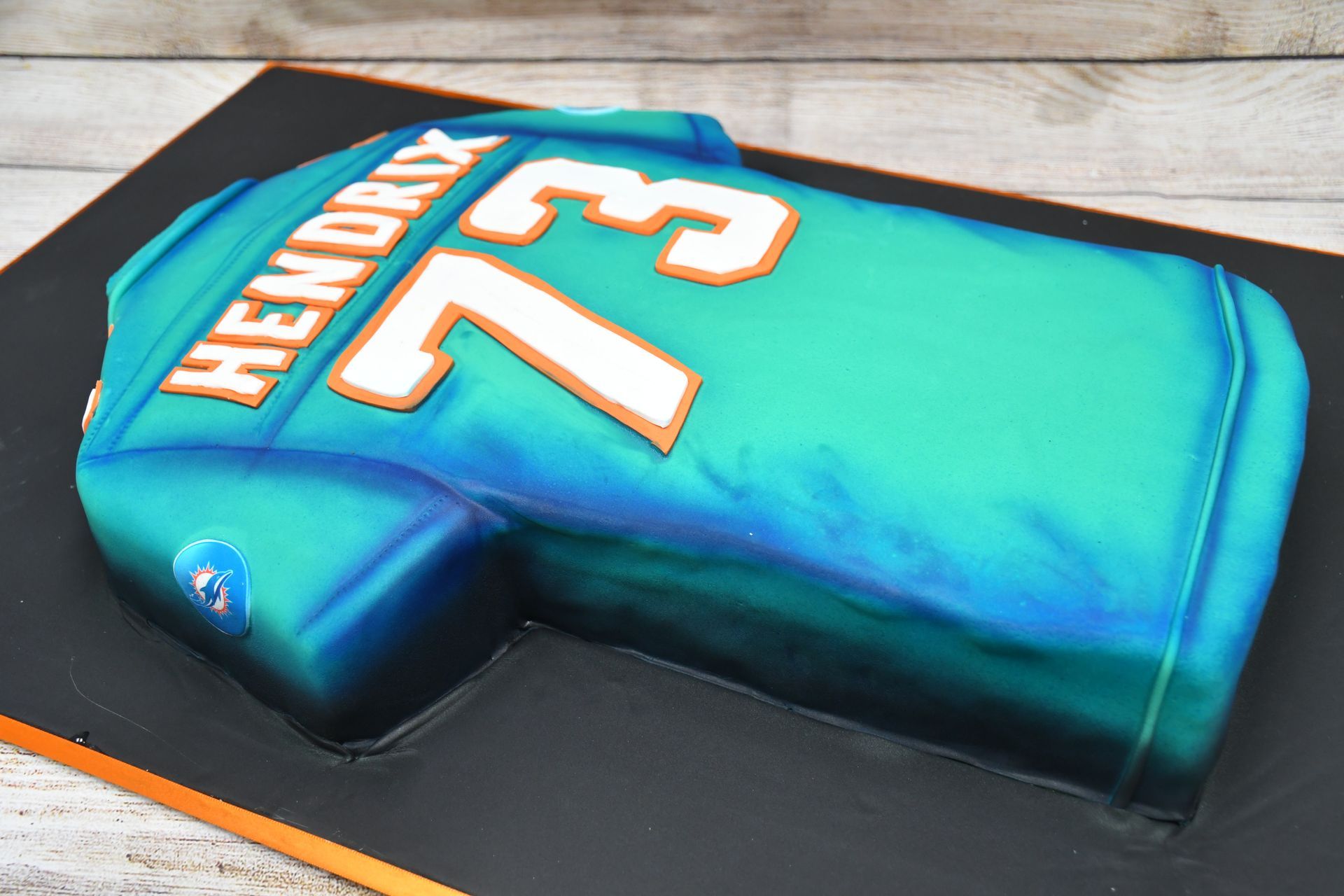 A cake in the shape of a hendrix jersey