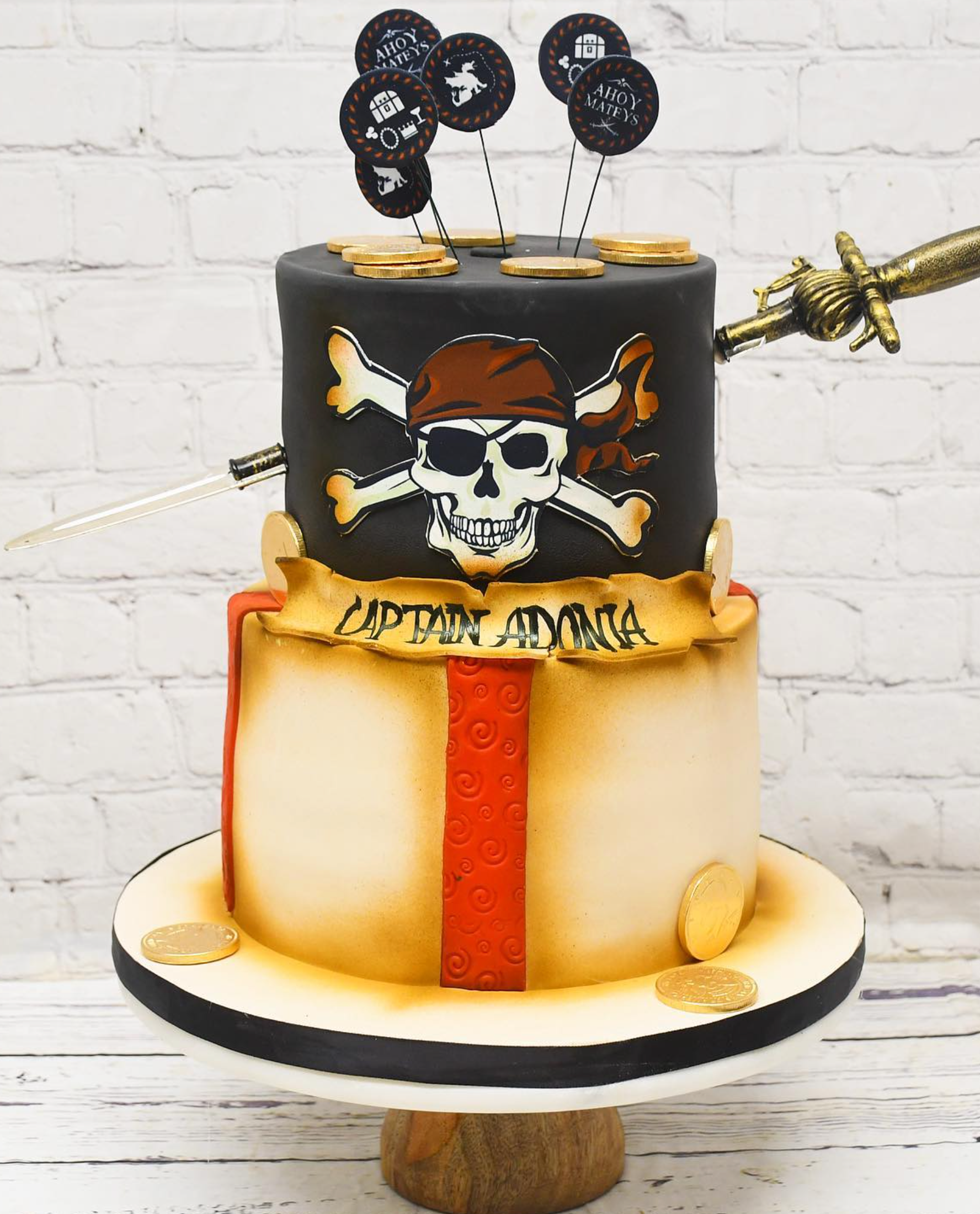 A pirate cake with a skull and crossbones on it