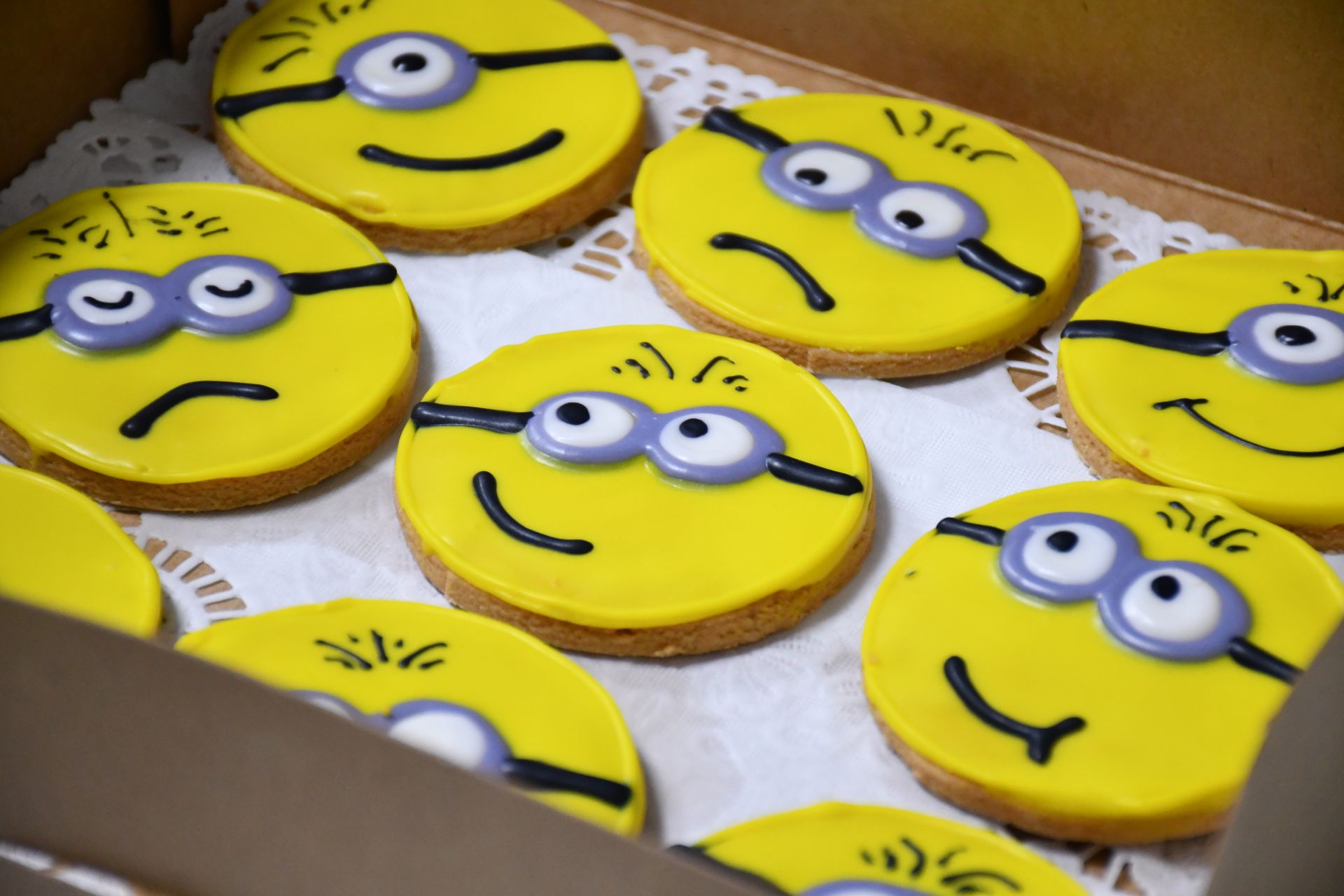 A box of cookies with minions faces on them