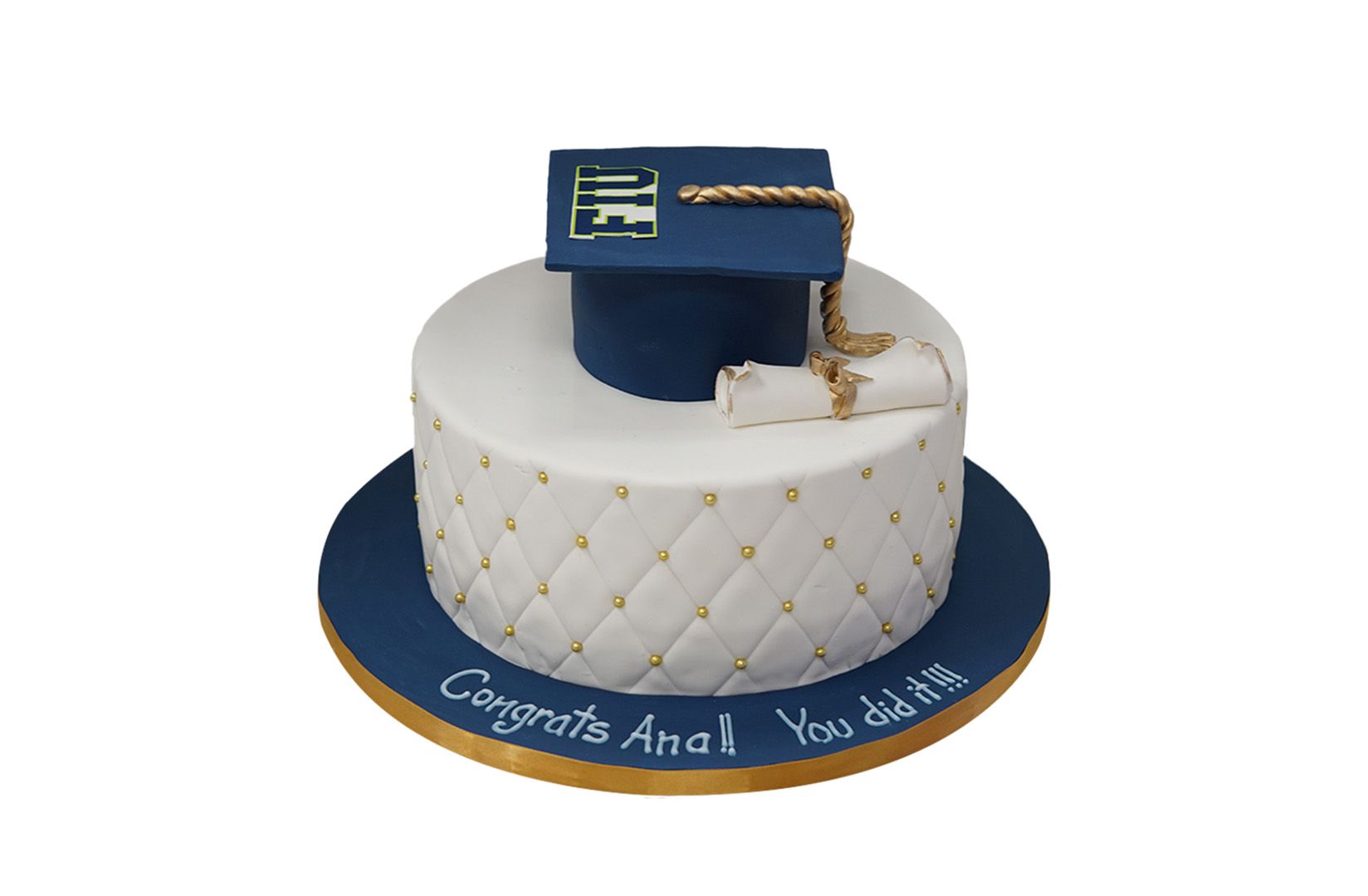 A cake with a graduation cap on top of it