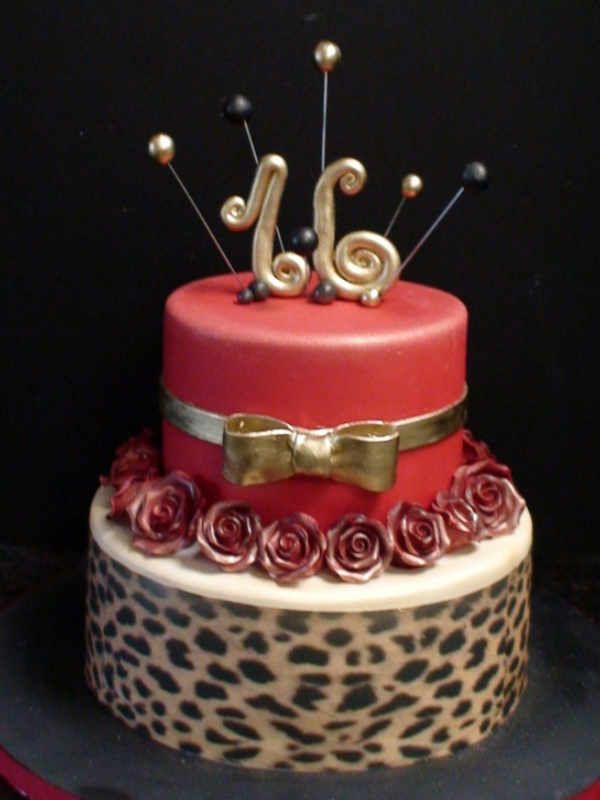 A red and leopard print cake with the number 16 on top