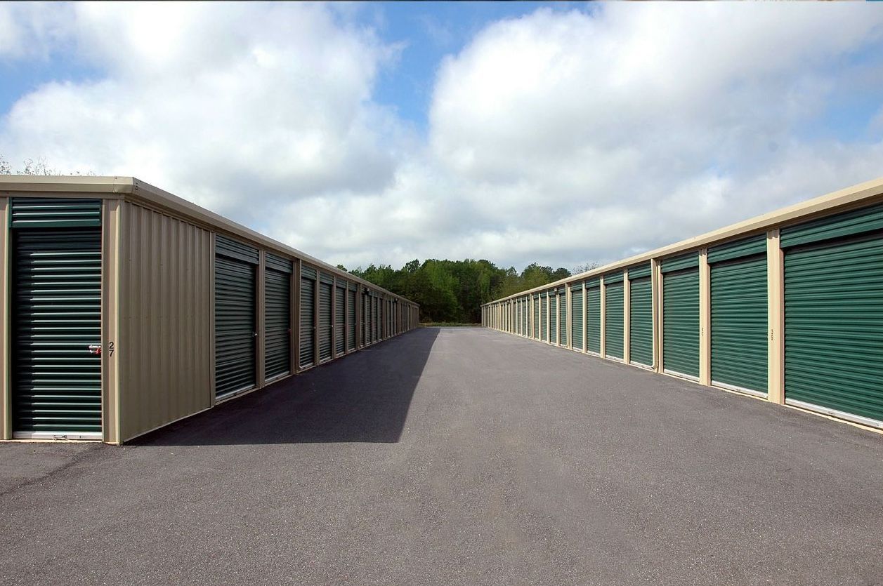 A modern, clean office space with rolling doors commercial warehouse outdoor.