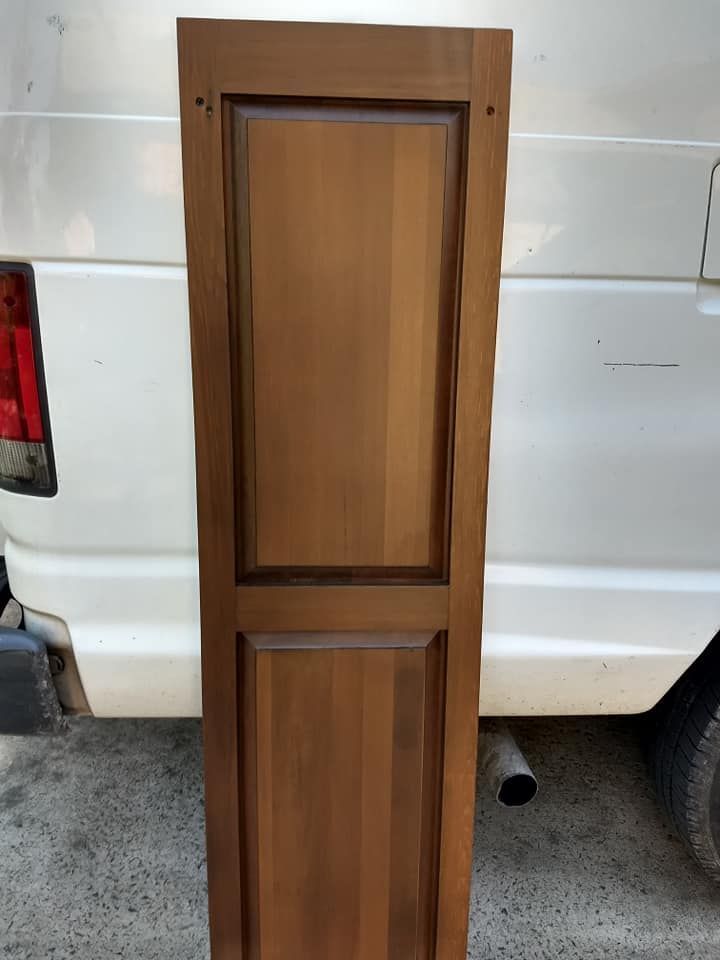 A house with a porch and stairs leading up to it