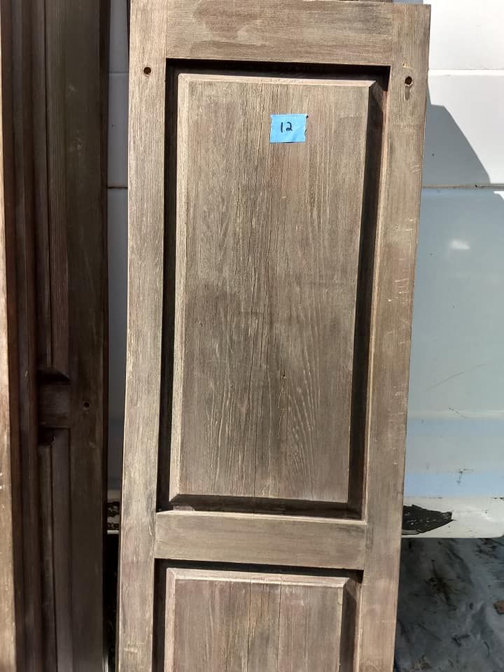 A house with a triangle shaped roof and a lot of windows