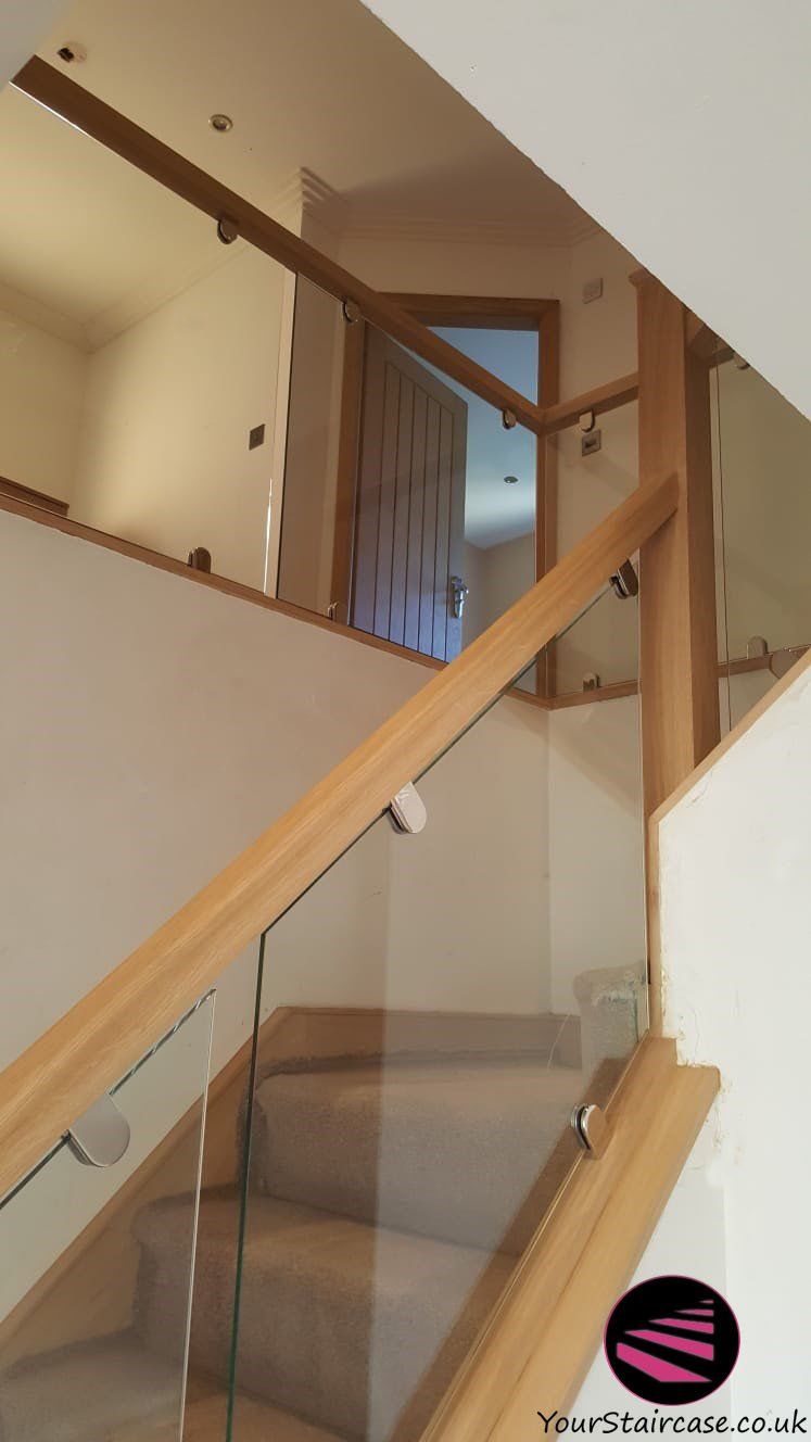 Glass stairway railing