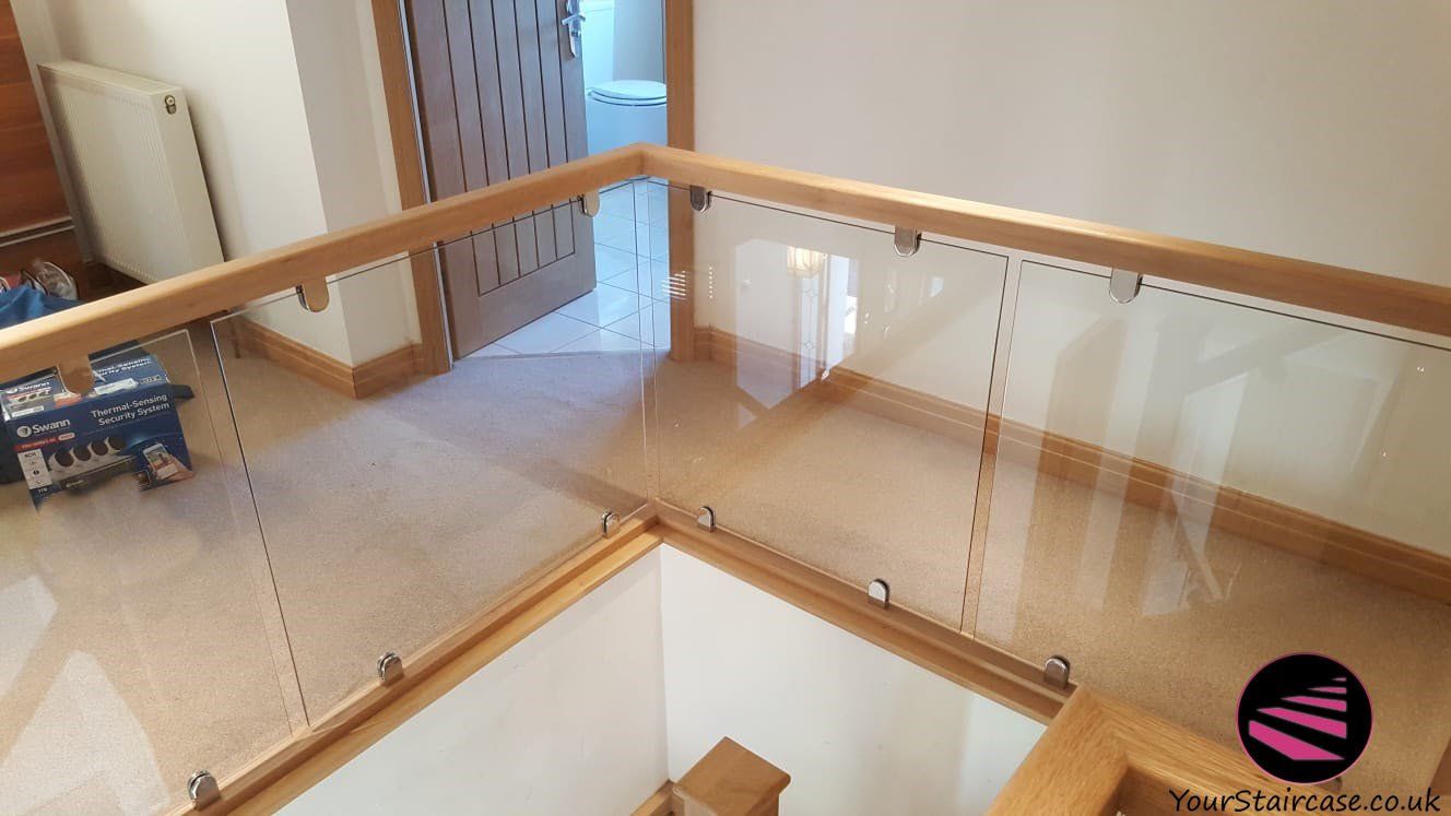 Your Staircase with glass in clamps