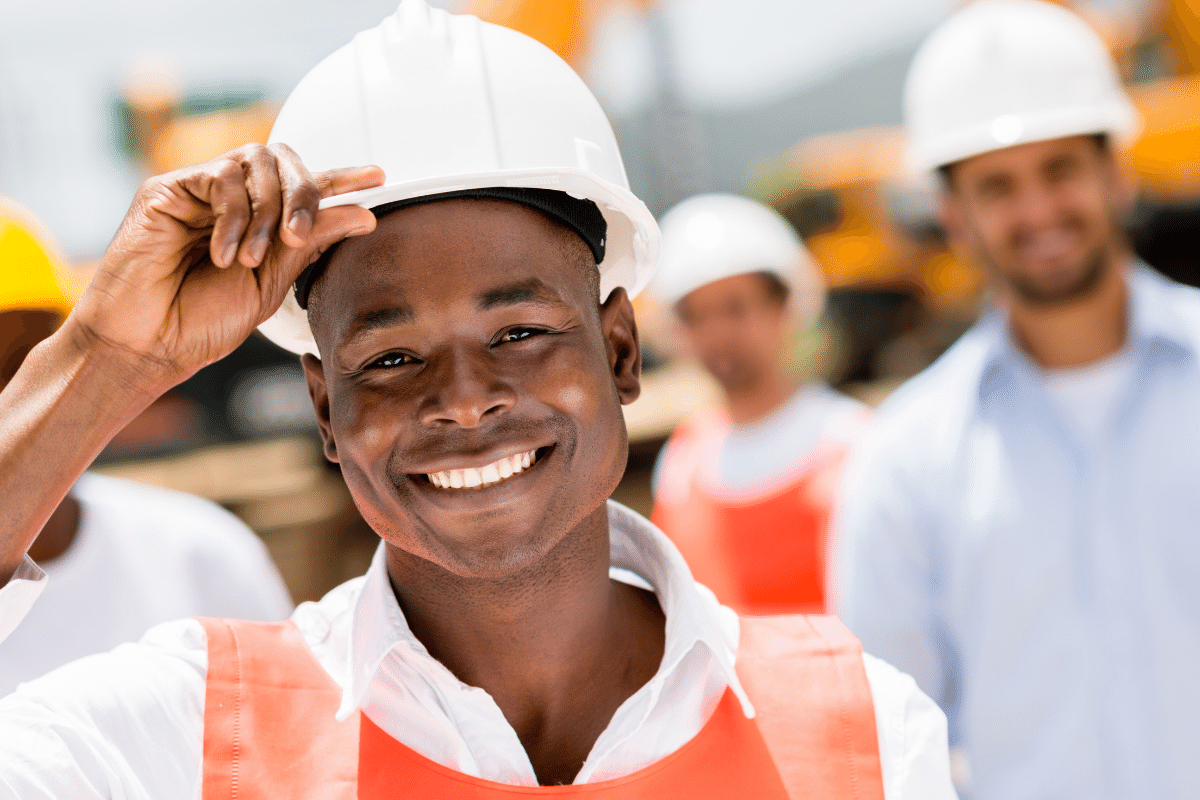 road construction workers talking to walkie talkie