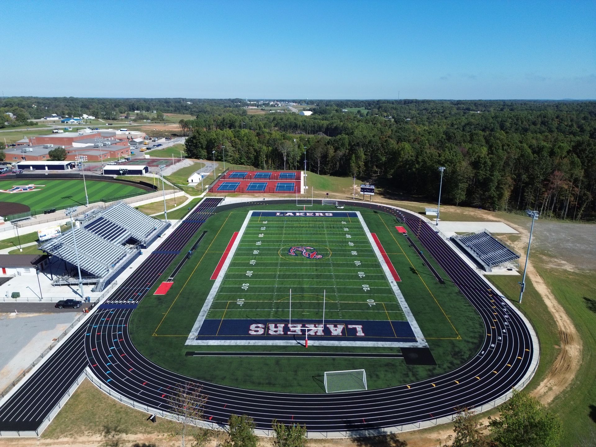 An aerial view of a football field and track.