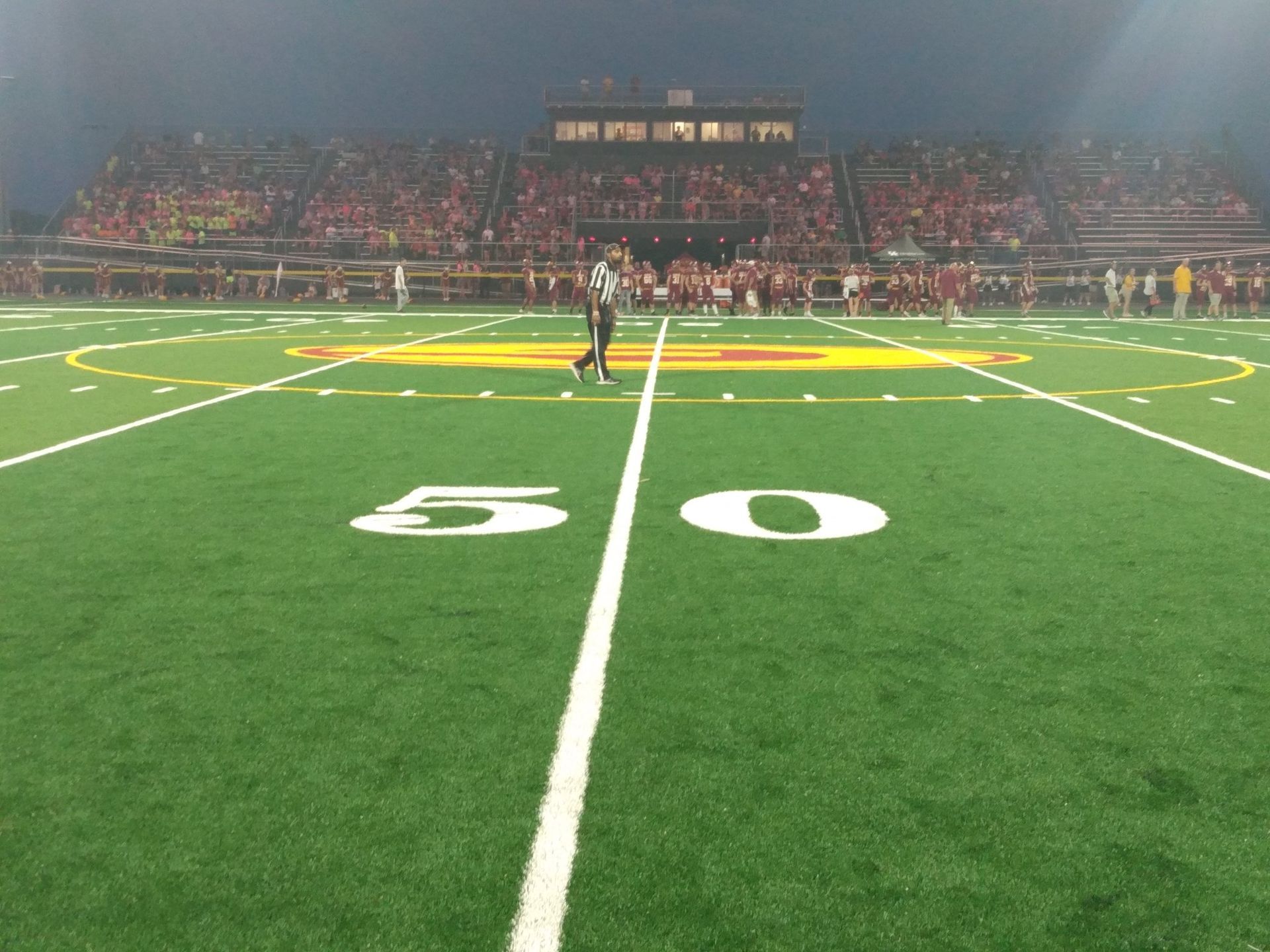A football field with the number 50 on it