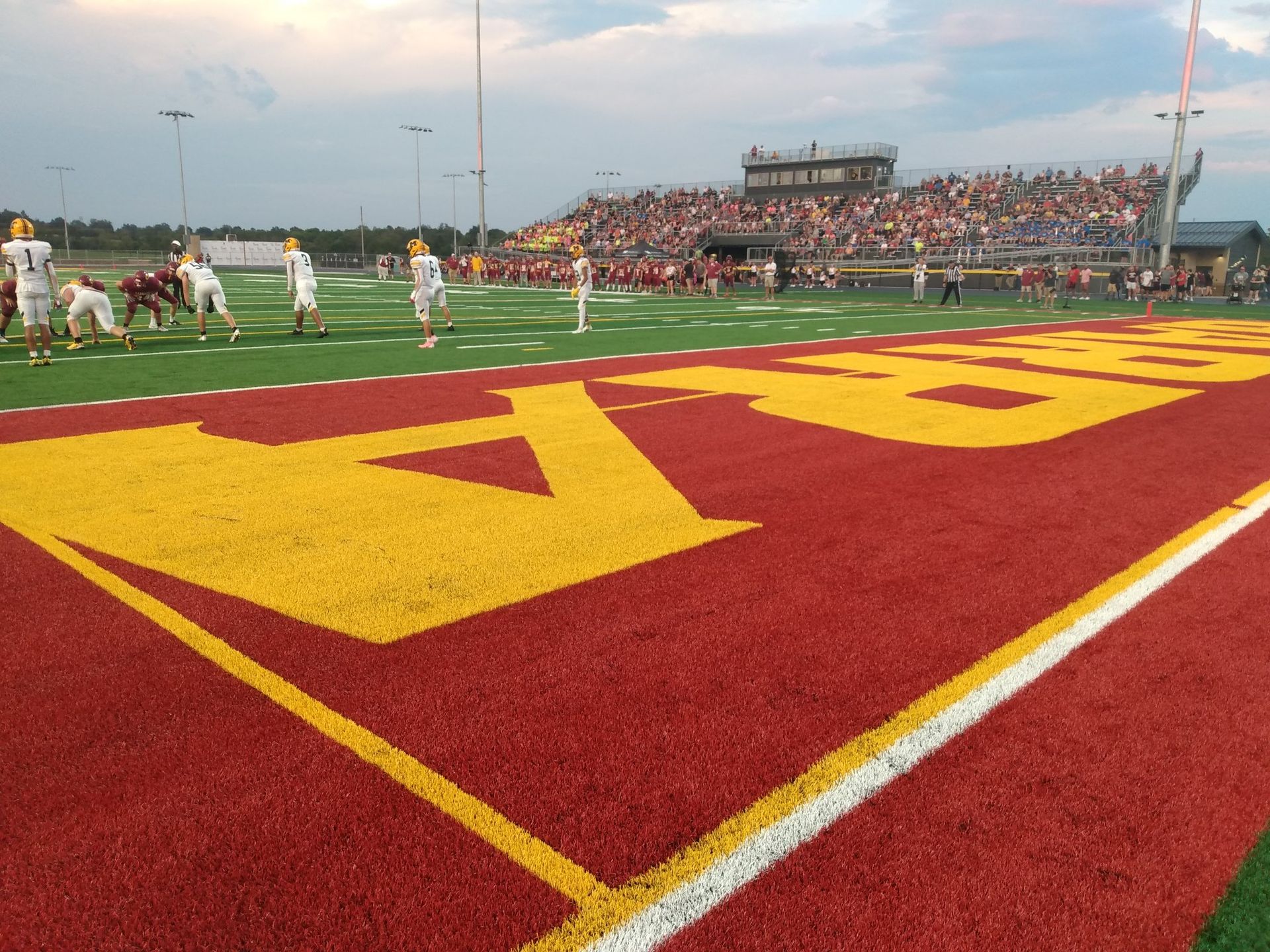 A football field with letters painted on it