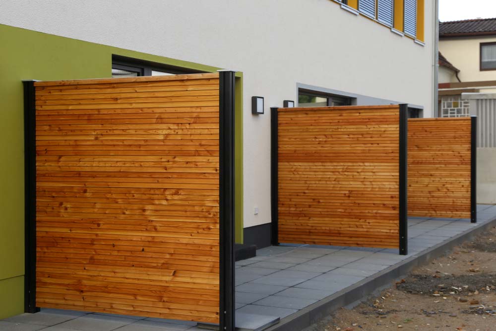 Modern Wooden Privacy Fences on a Residential Complex — Custom Builder in Tweed Heads, NSW