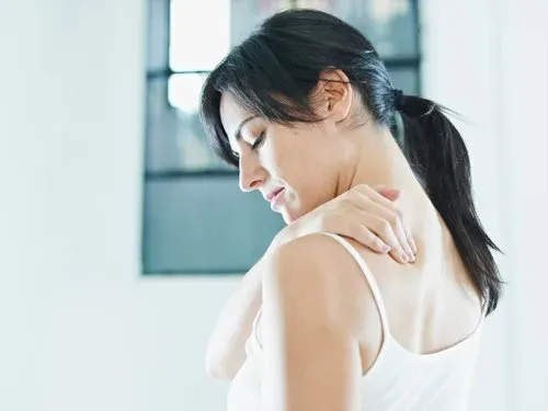 Woman Wearing Sando Holding Her Neck — Clearwater, FL — Pain Care Management