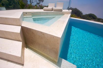 outdoor pool with chairs