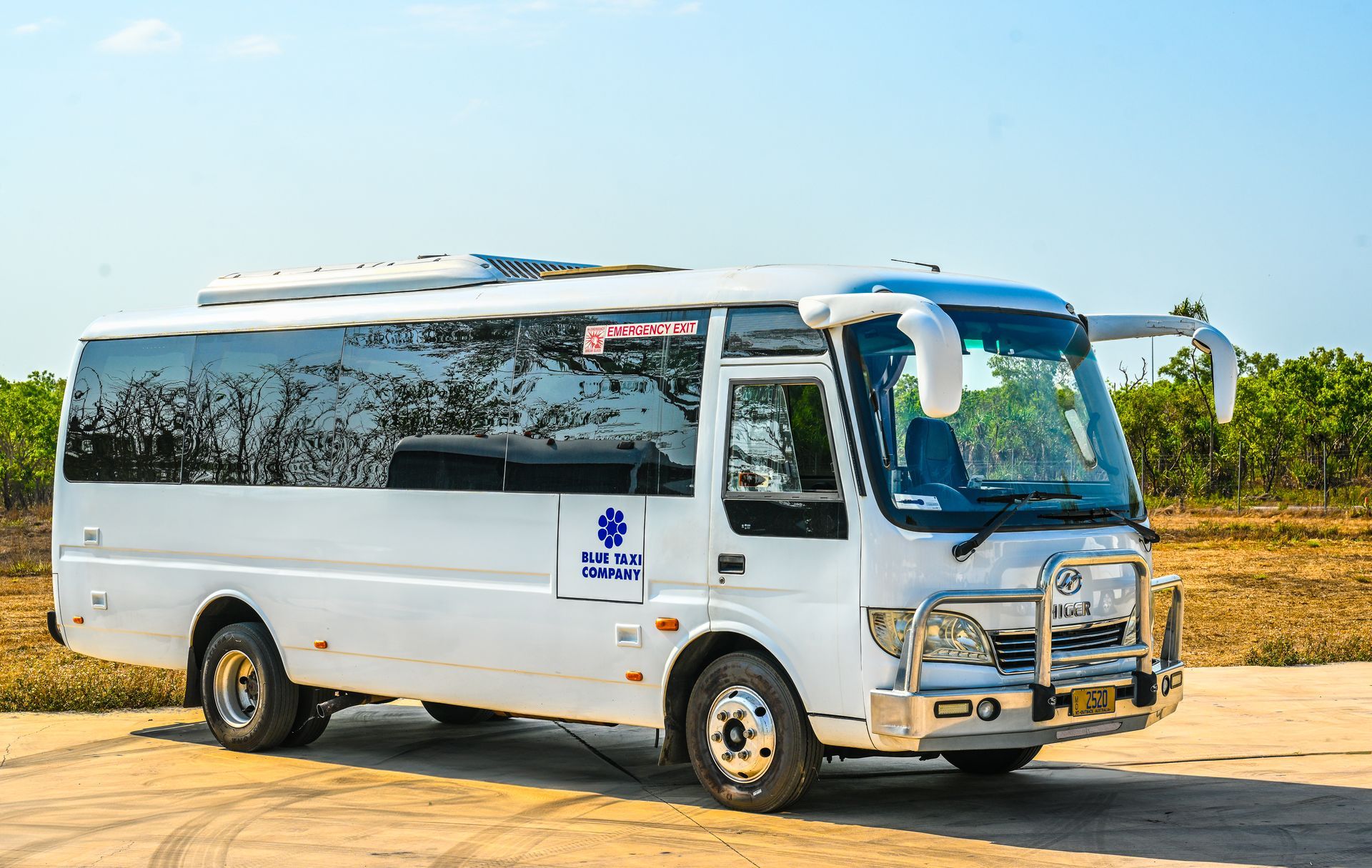 three white charter buses - Charter Transport in Darwin, NT