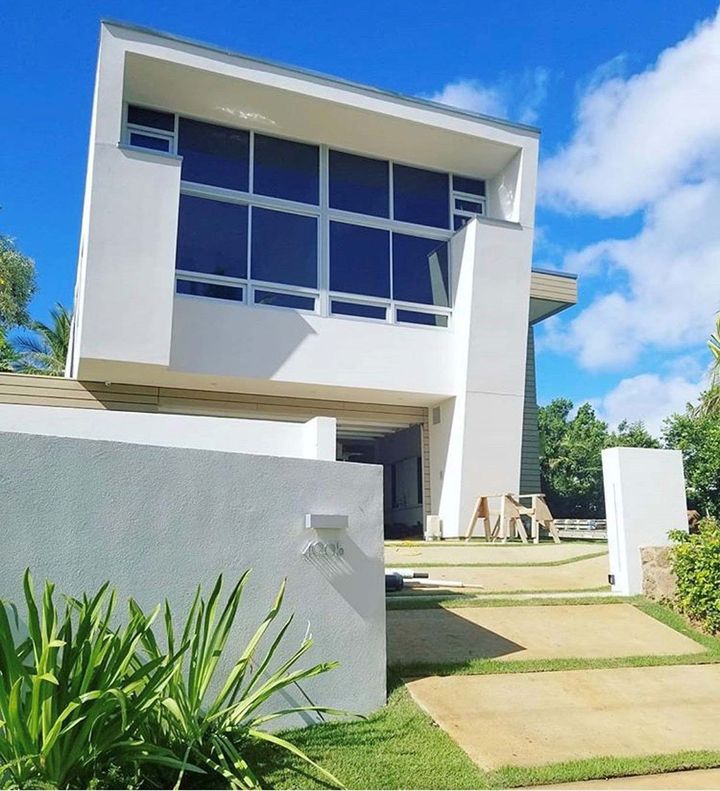 White modern house — Kailua, HI — Malama Aina Landscape and Masonry Design