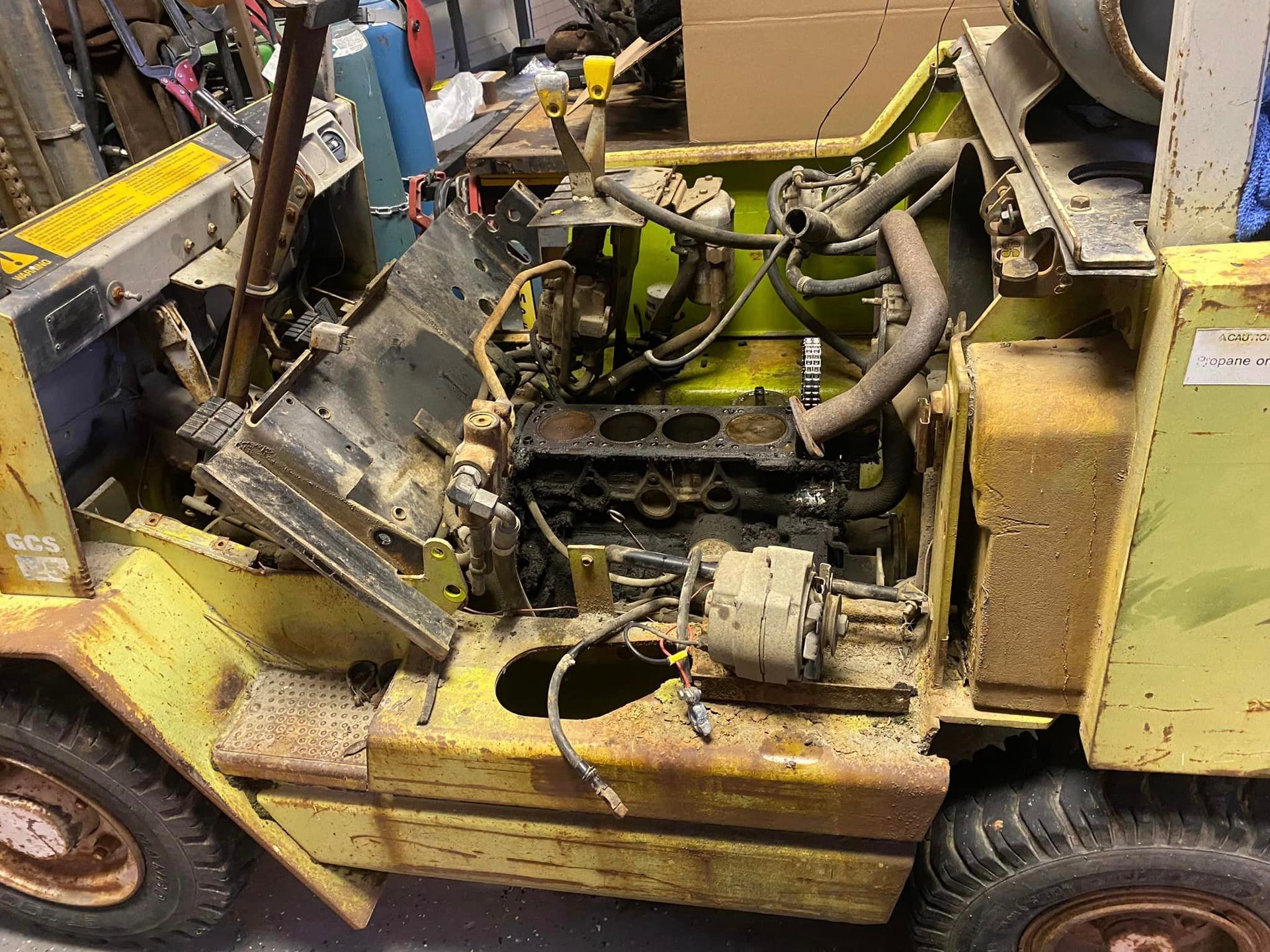 Yellow Forklift with The Engine Removed — Santa Cruz, CA — Santa Cruz All Star Body Works